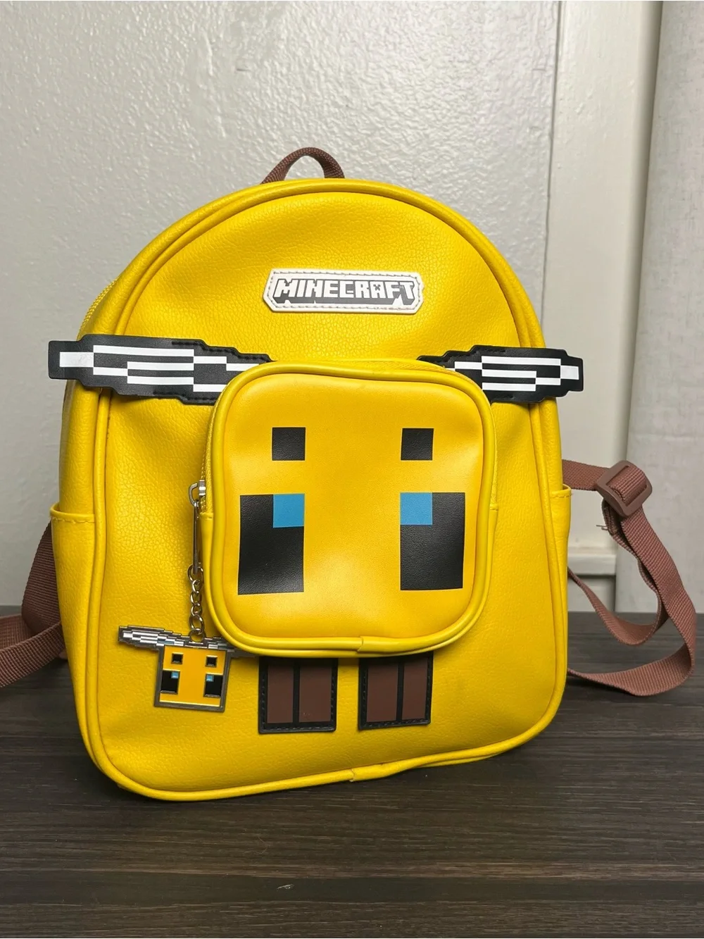 Buzz Into Adventure: Iconic Minecraft Bee Mini Backpack for Gamers & Fans
